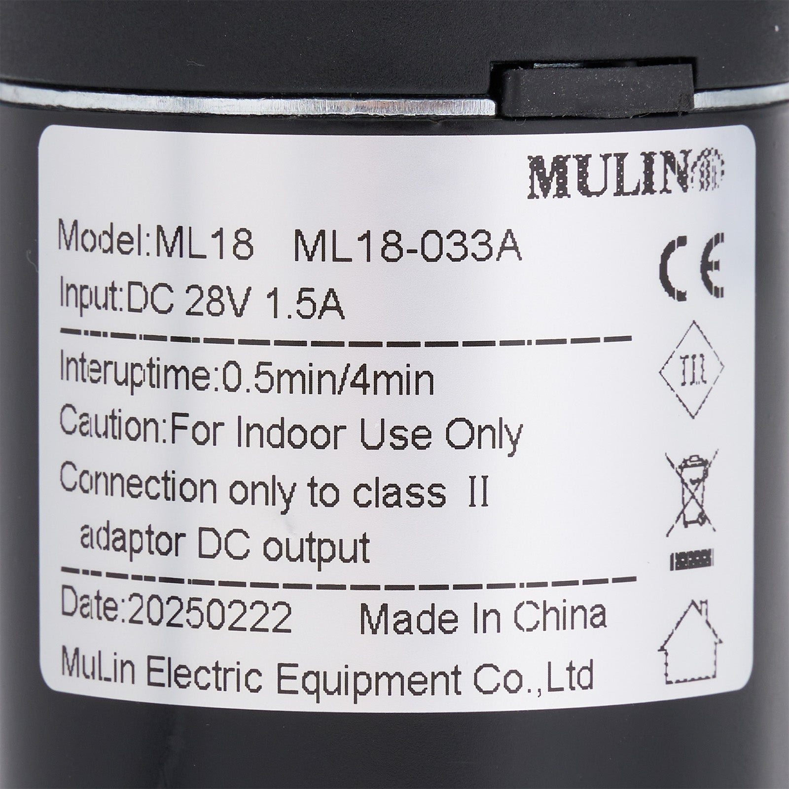 Label on a black electronic device with technical specifications and branding.