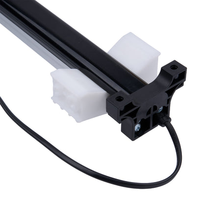 Black linear actuator with white end pieces on a white background
