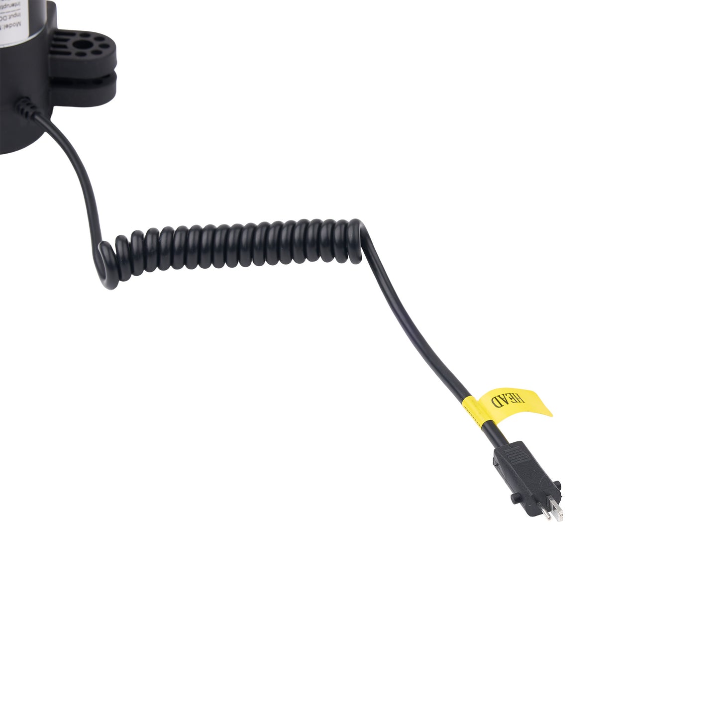 A black coiled extension cord with a yellow warning tag and a black plug connector, shown against a plain white background.