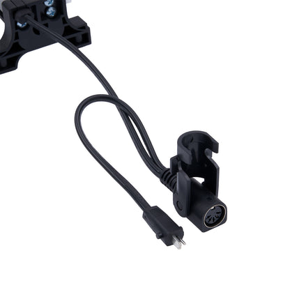 Black electronic component with cable on a white background