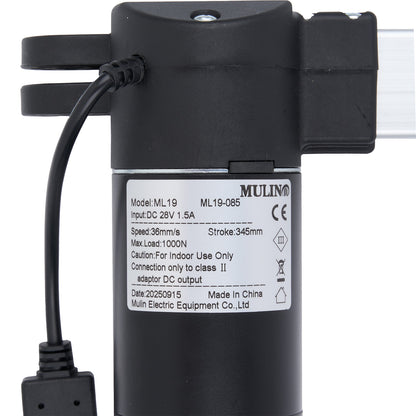 Black electric actuator with label on a white background