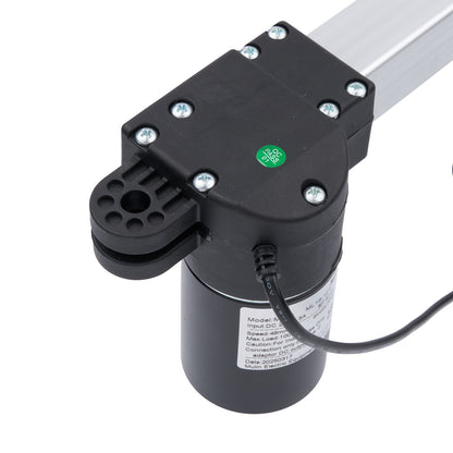 Black actuator with a green label on a white background