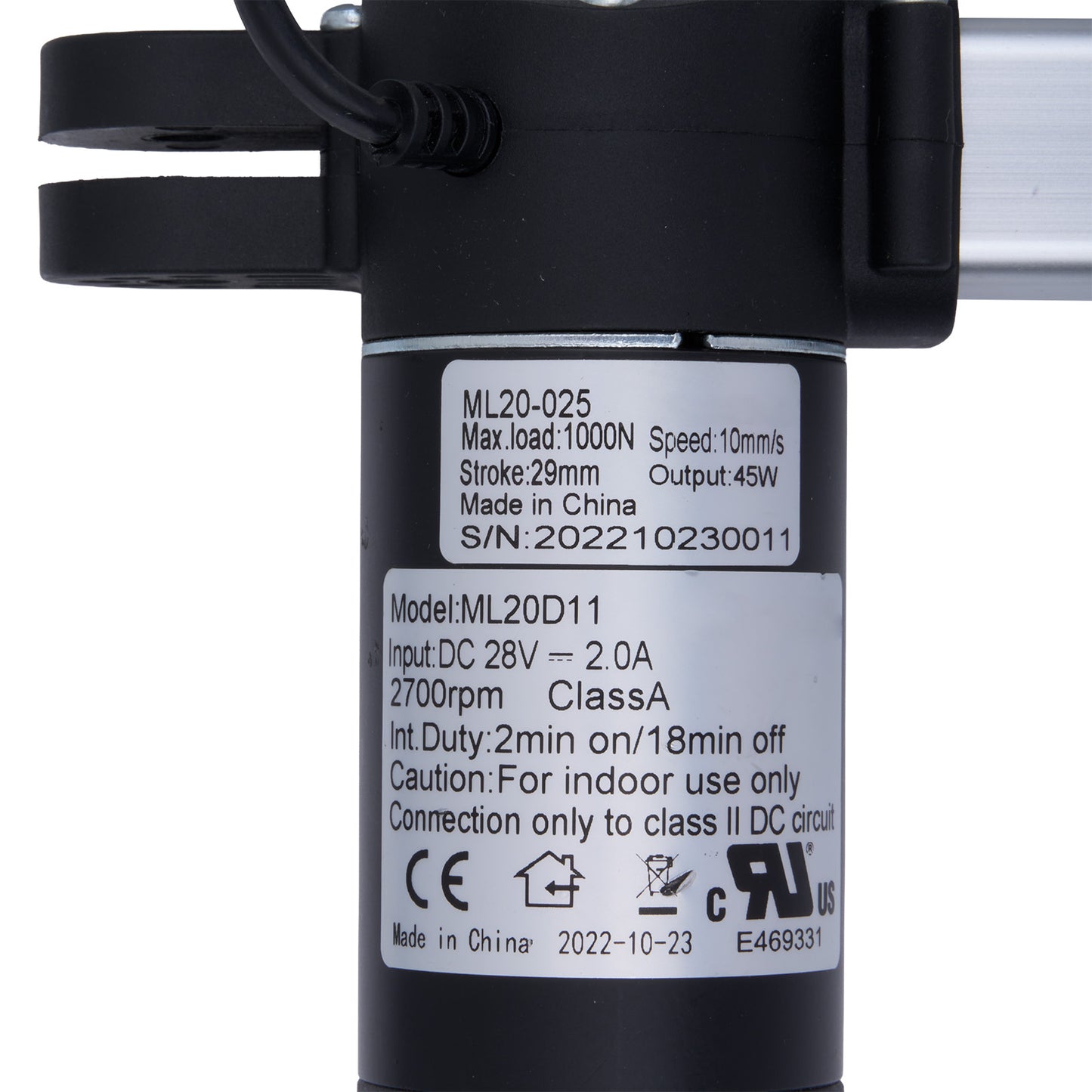 Black mechanical component with technical specifications label on a white background