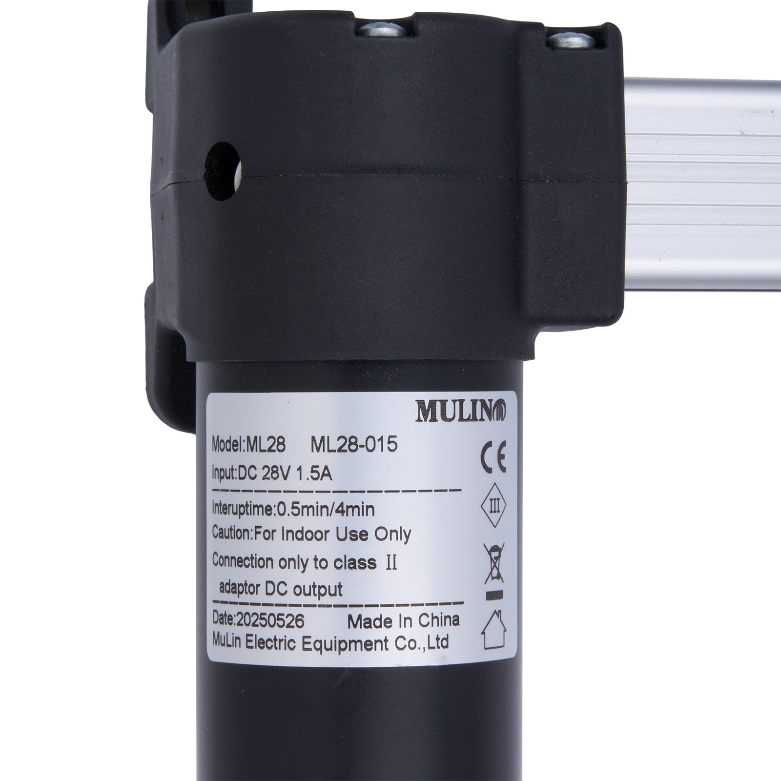 Black cylindrical device with a label on a white background