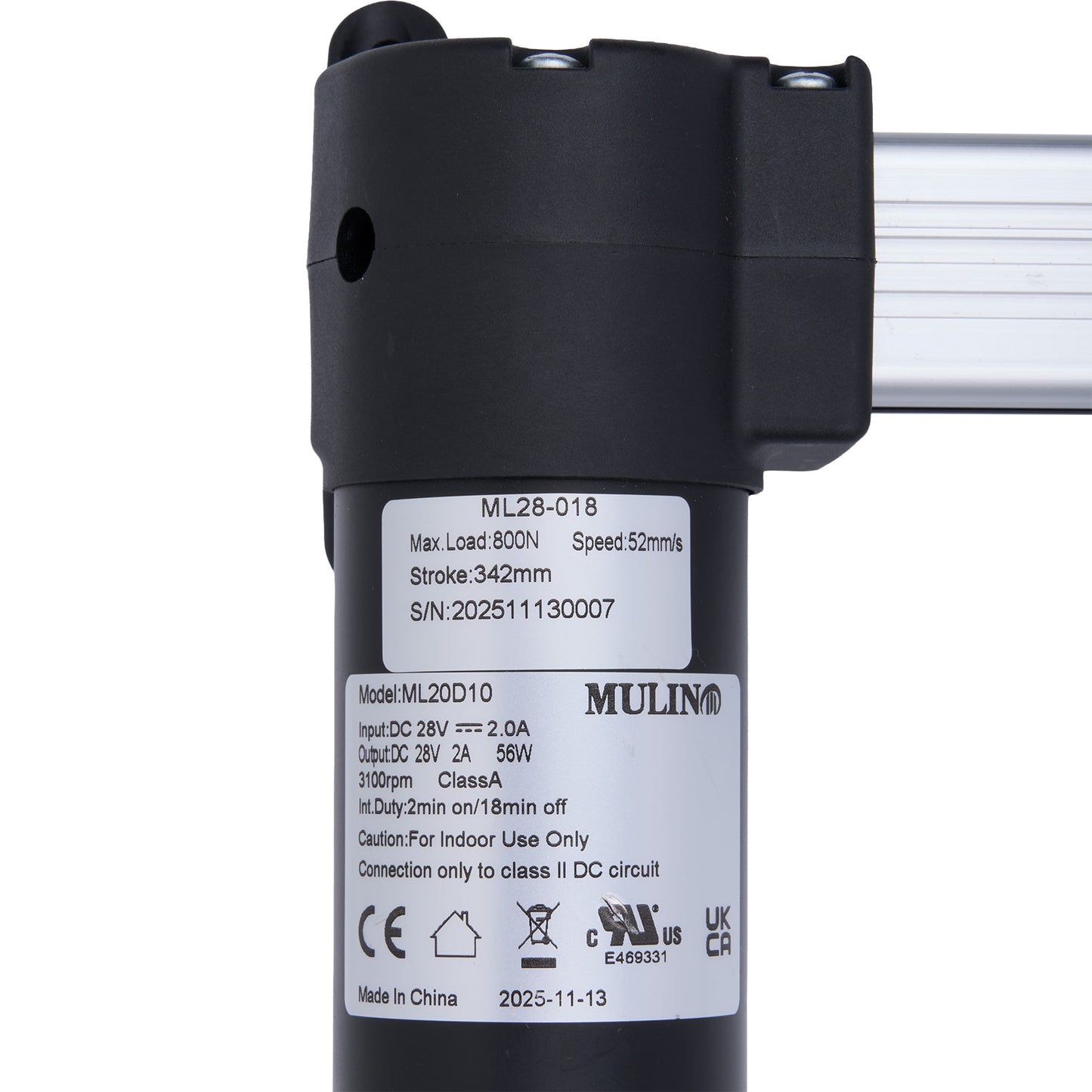 Black actuator with label on a white background