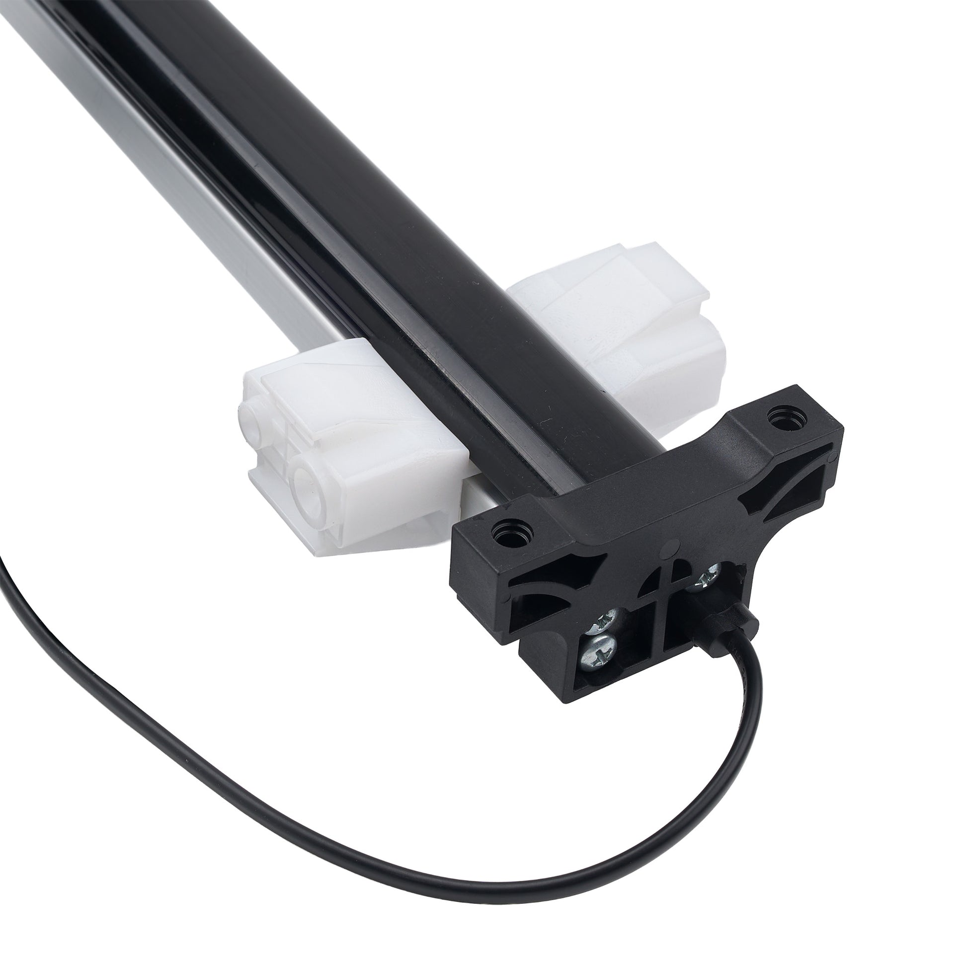 A close-up of a linear motor or drive assembly with a black rail, black terminal housing, white plastic mounting blocks, and a black cable on a white background.