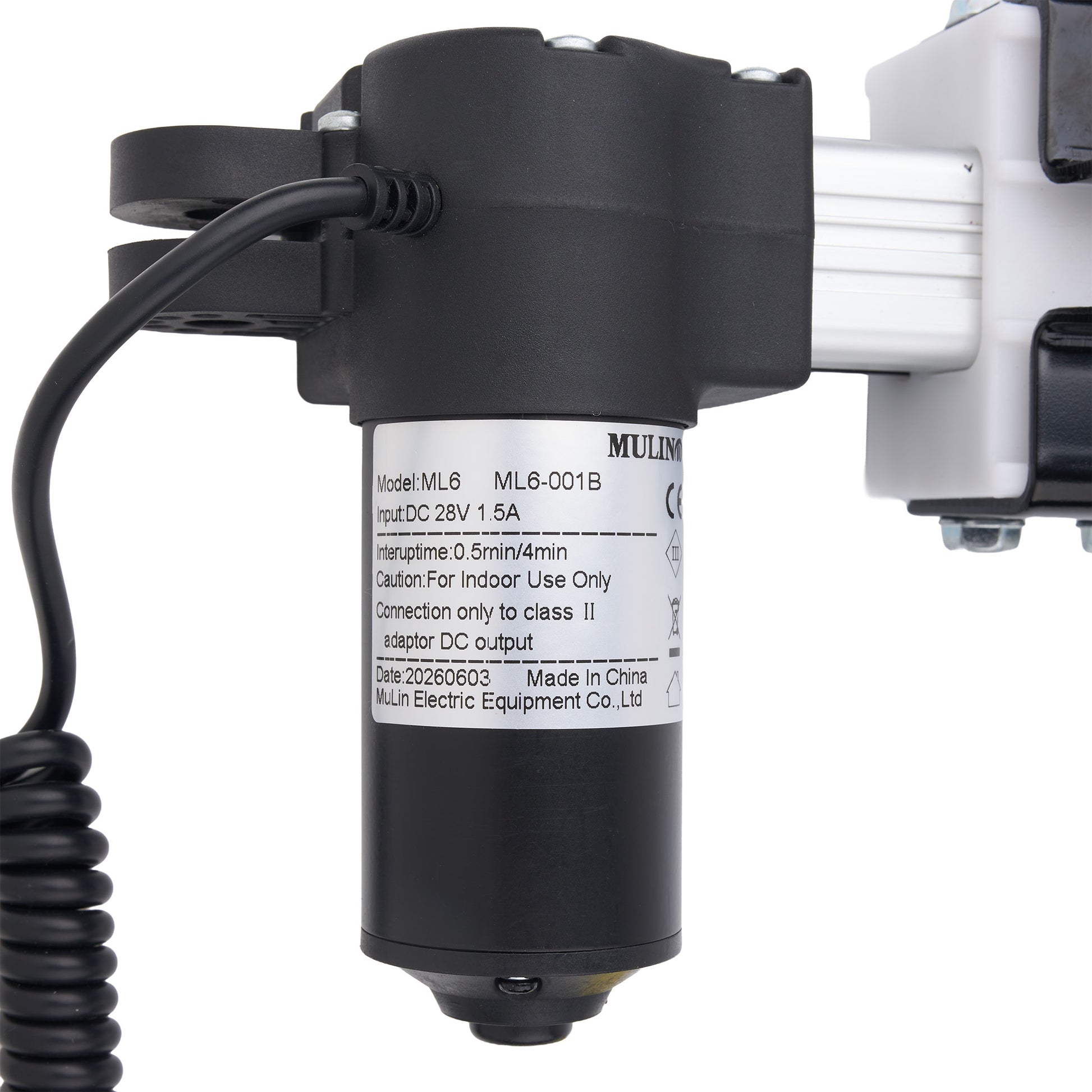 A close-up of a black pneumatic directional valve with a coiled black cable, a white label with specifications, and a white and black mounting bracket on a white background.