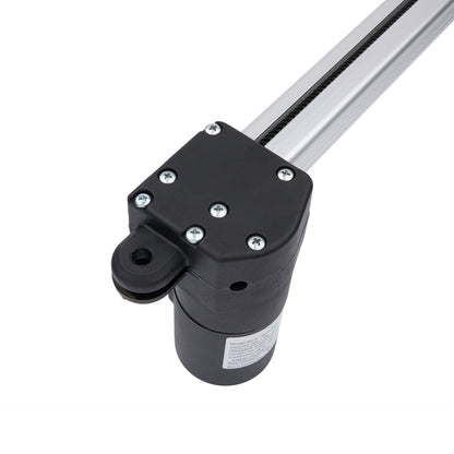Black mechanical component with metallic rod on a white background