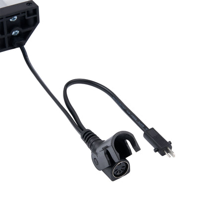 Black electrical cable with plug and connector on a white background