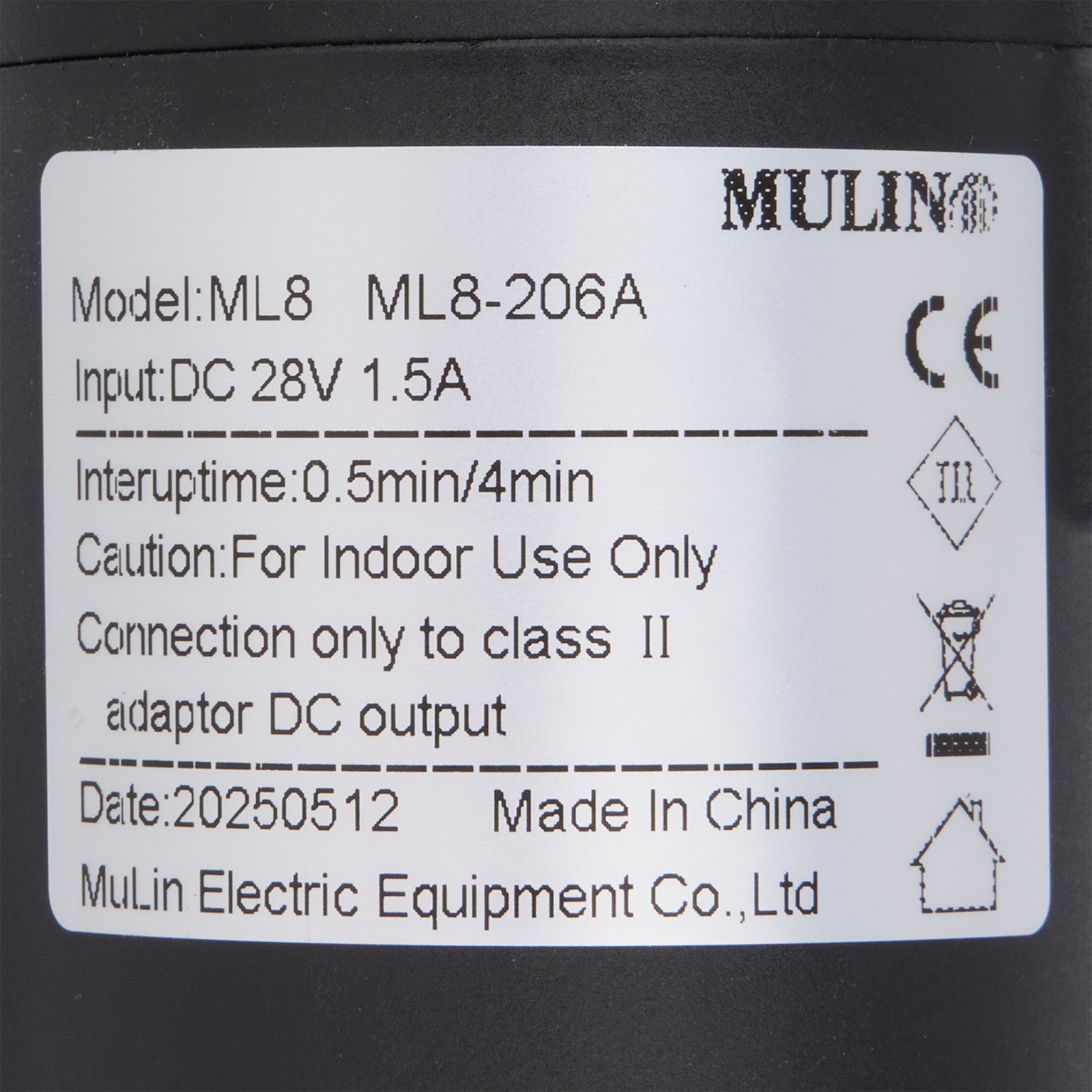 Label with technical specifications and branding on a black background