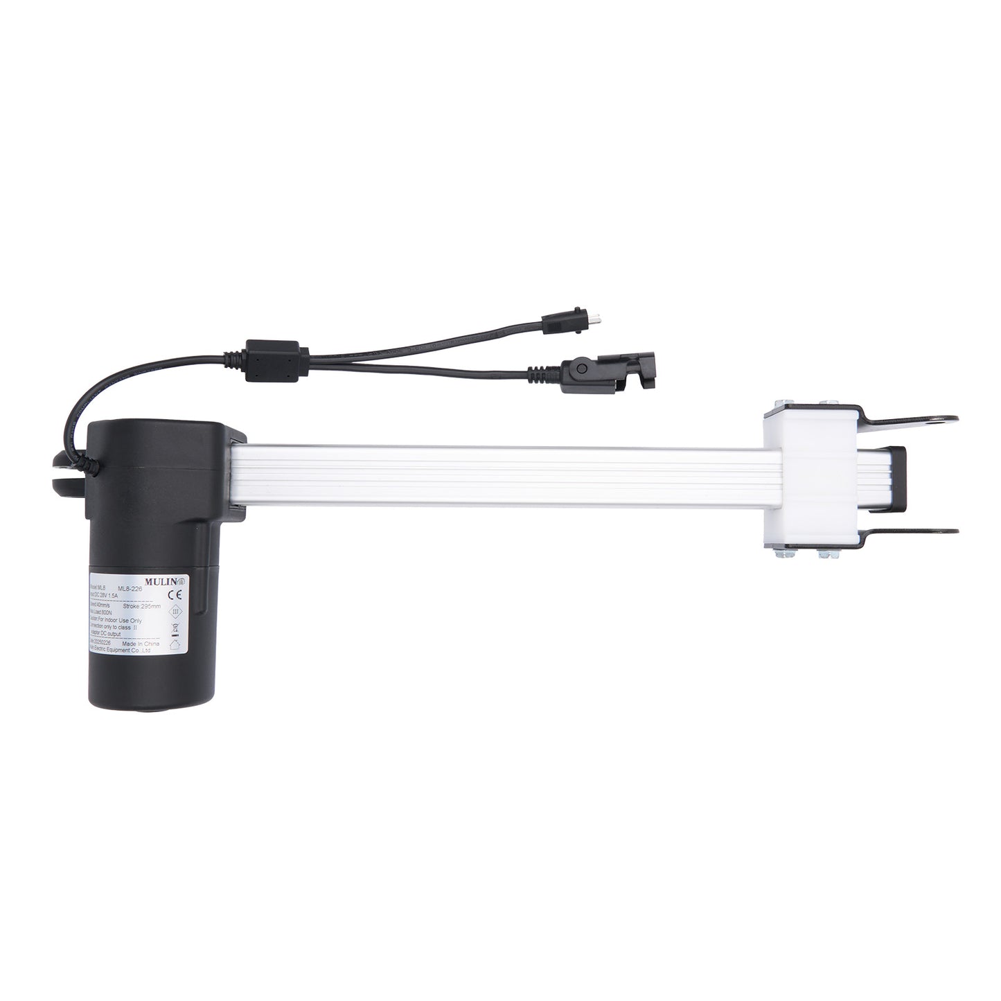 Electrical components including a black cylindrical device and white plug on a white background