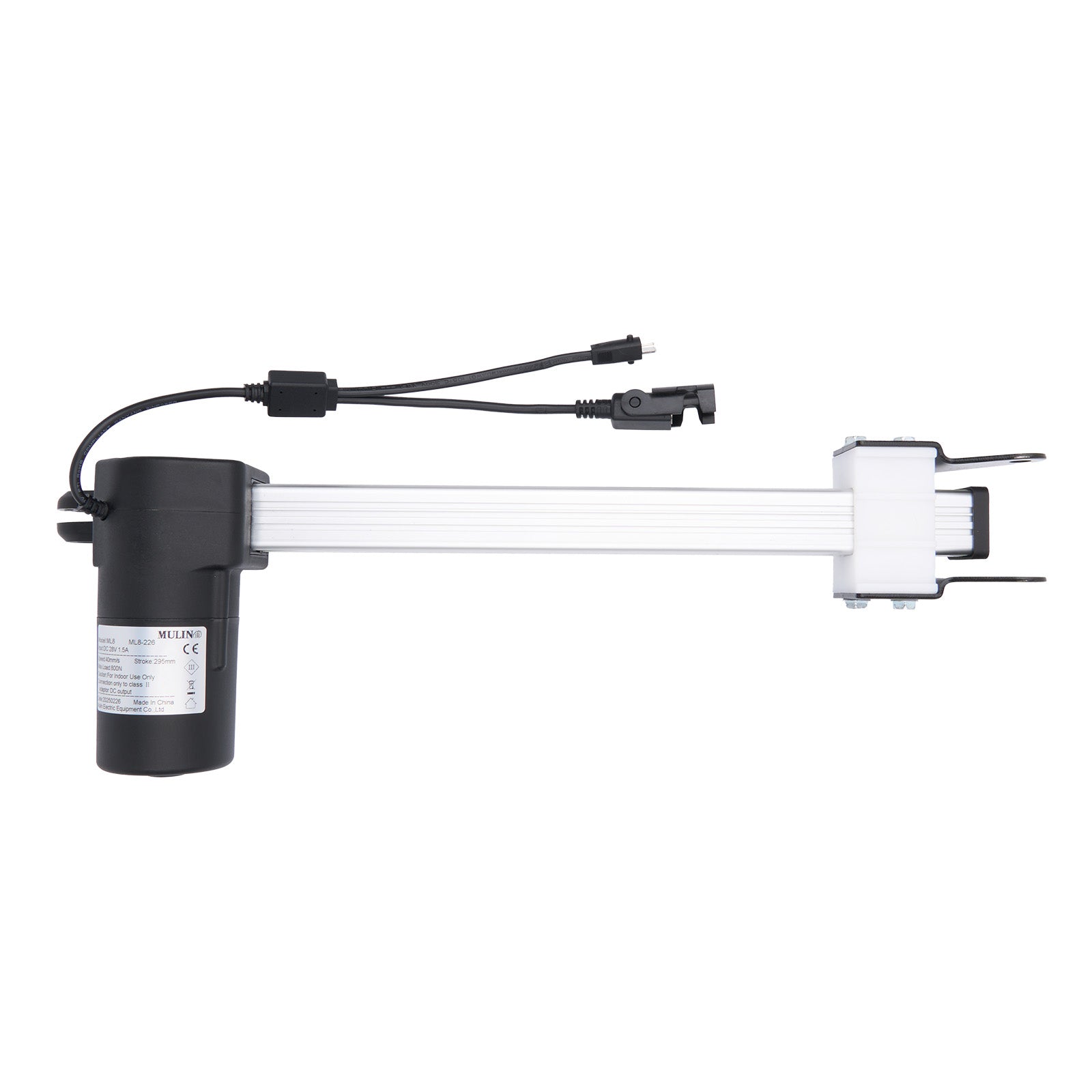 Electrical components including a black cylindrical device and white plug on a white background