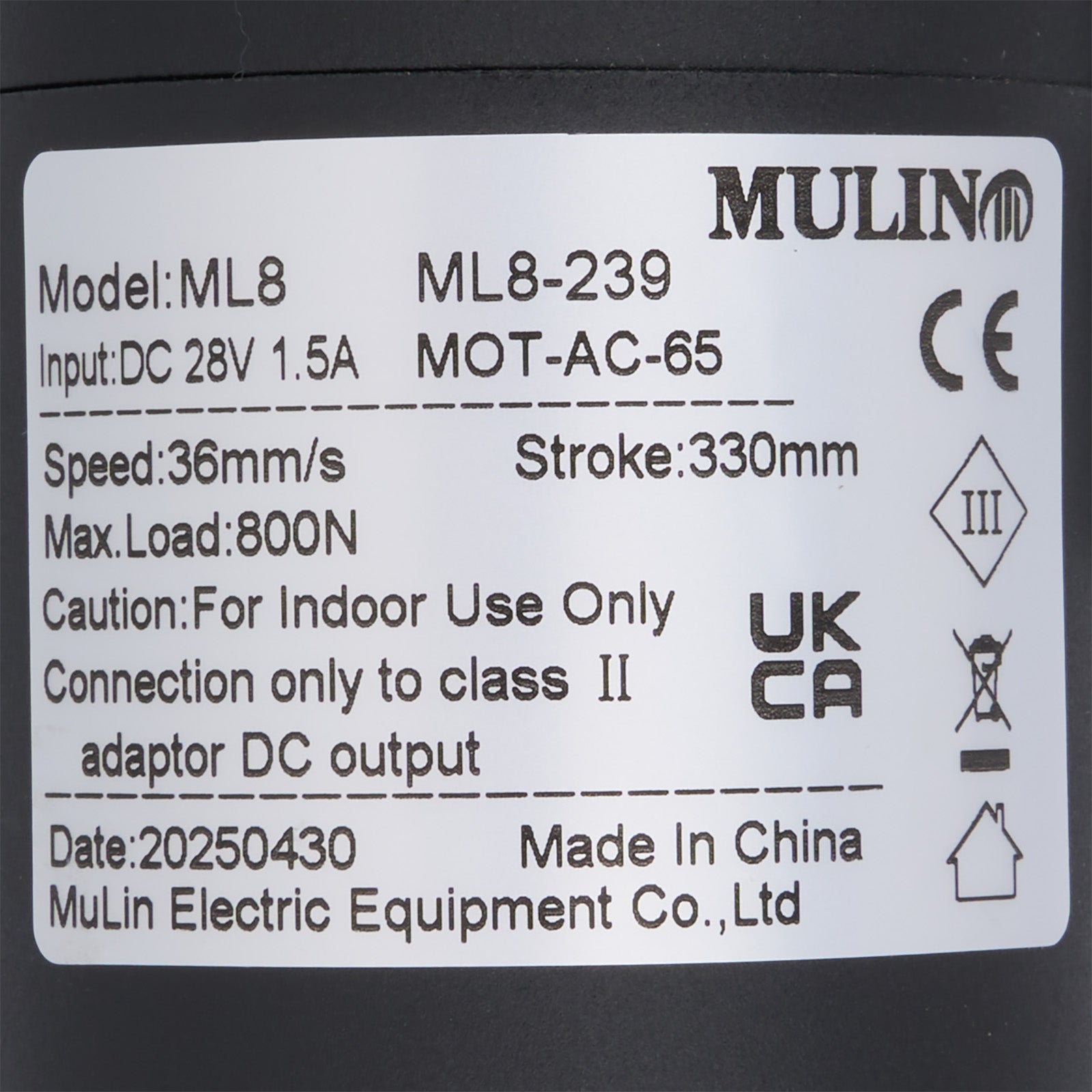 Label with technical specifications and branding on a black background