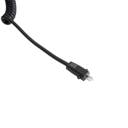 Black coiled cable with connectors on a white background