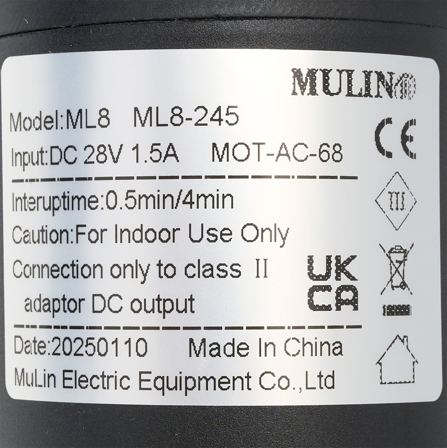 Label on a black cylindrical device with technical specifications and branding.