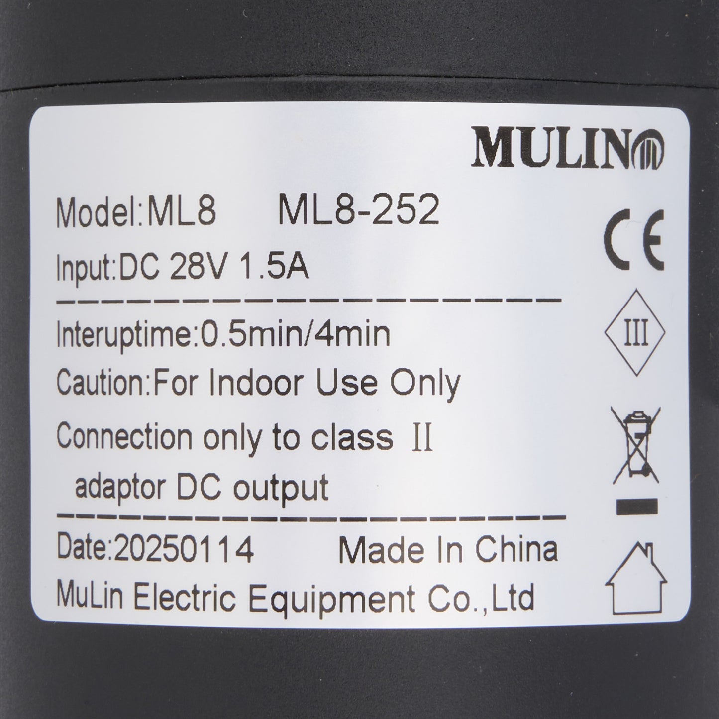 Label with technical specifications and branding on a black background