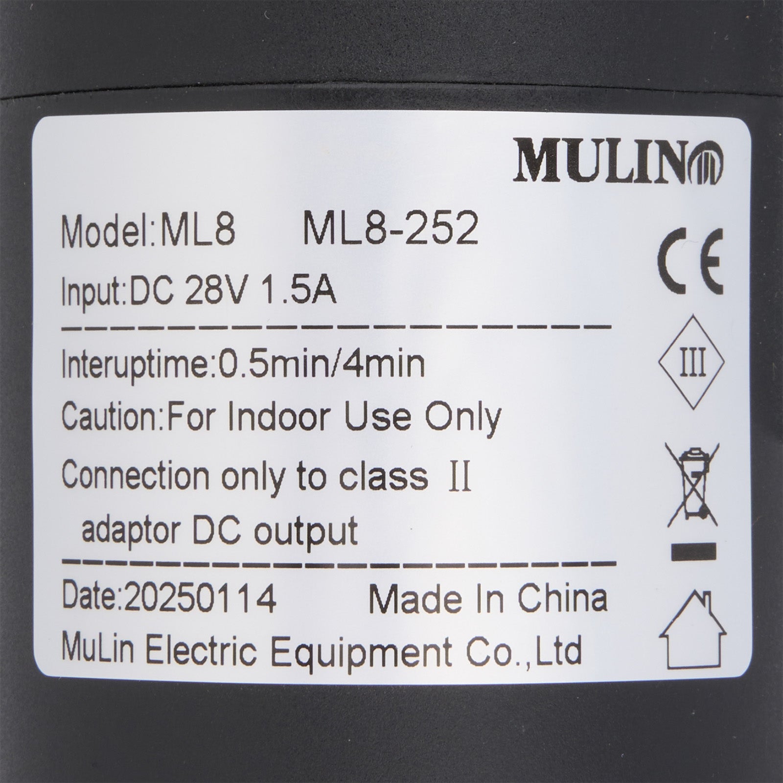 Label with technical specifications and branding on a black background