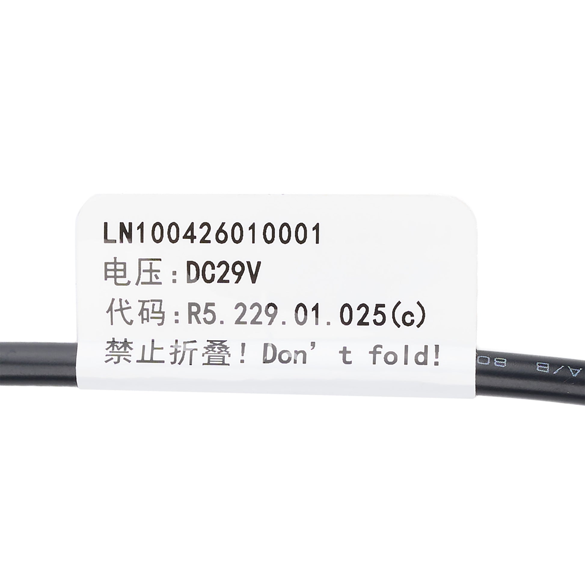 A close-up of a black cable with a white label printed with product code LN100426010001, DC29V voltage, and a 'Don't fold!' warning in Chinese and English.