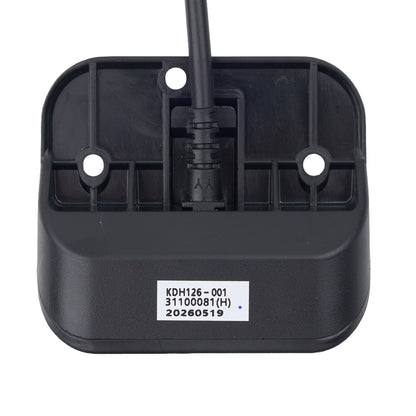 Black plastic component with a label on a white background