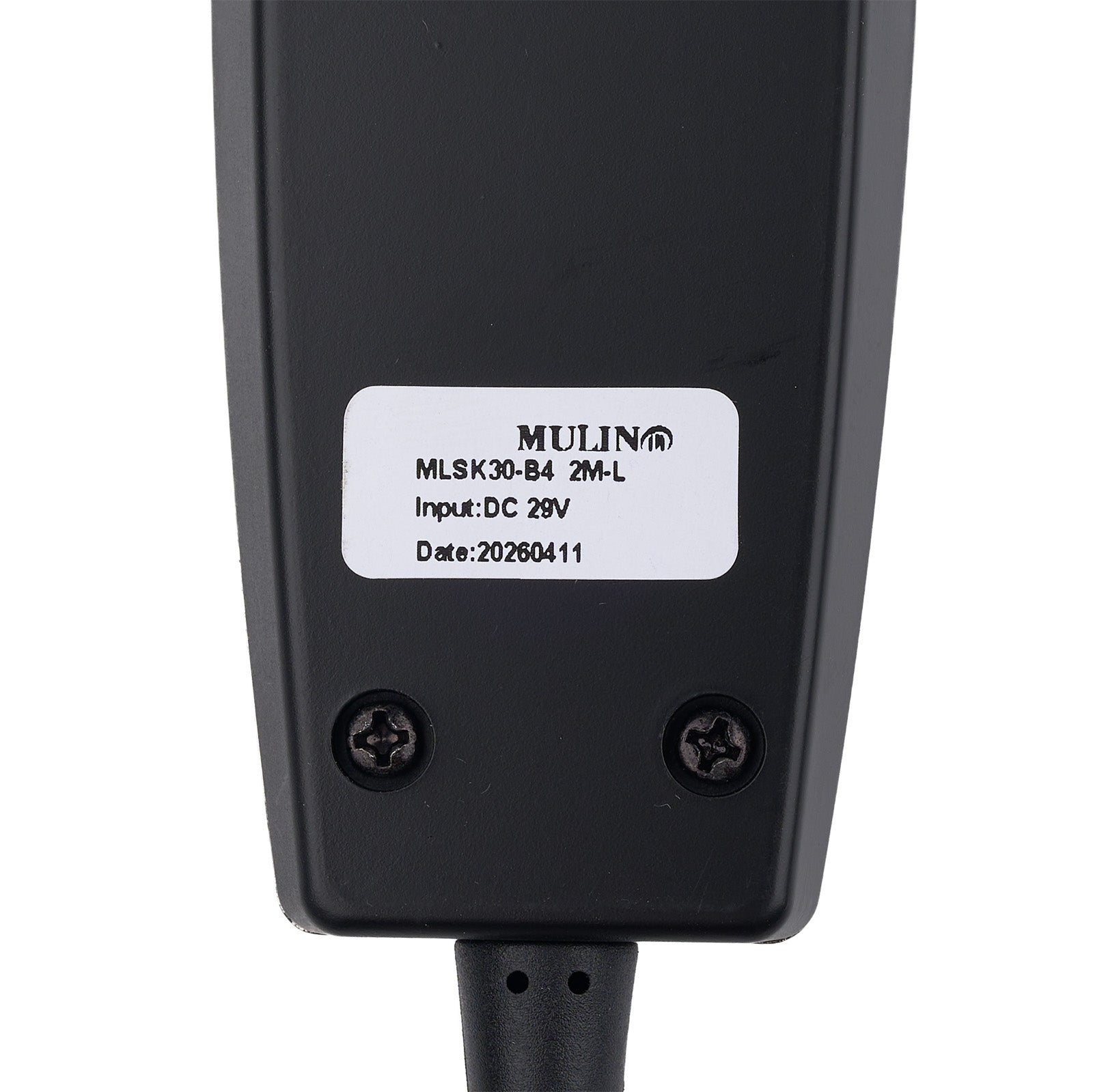 Close-up of the back of a black electronic device with a white product label reading MULIN MLSK30-B4 2M-L, Input: DC 29V, Date:20260411, on a white background.