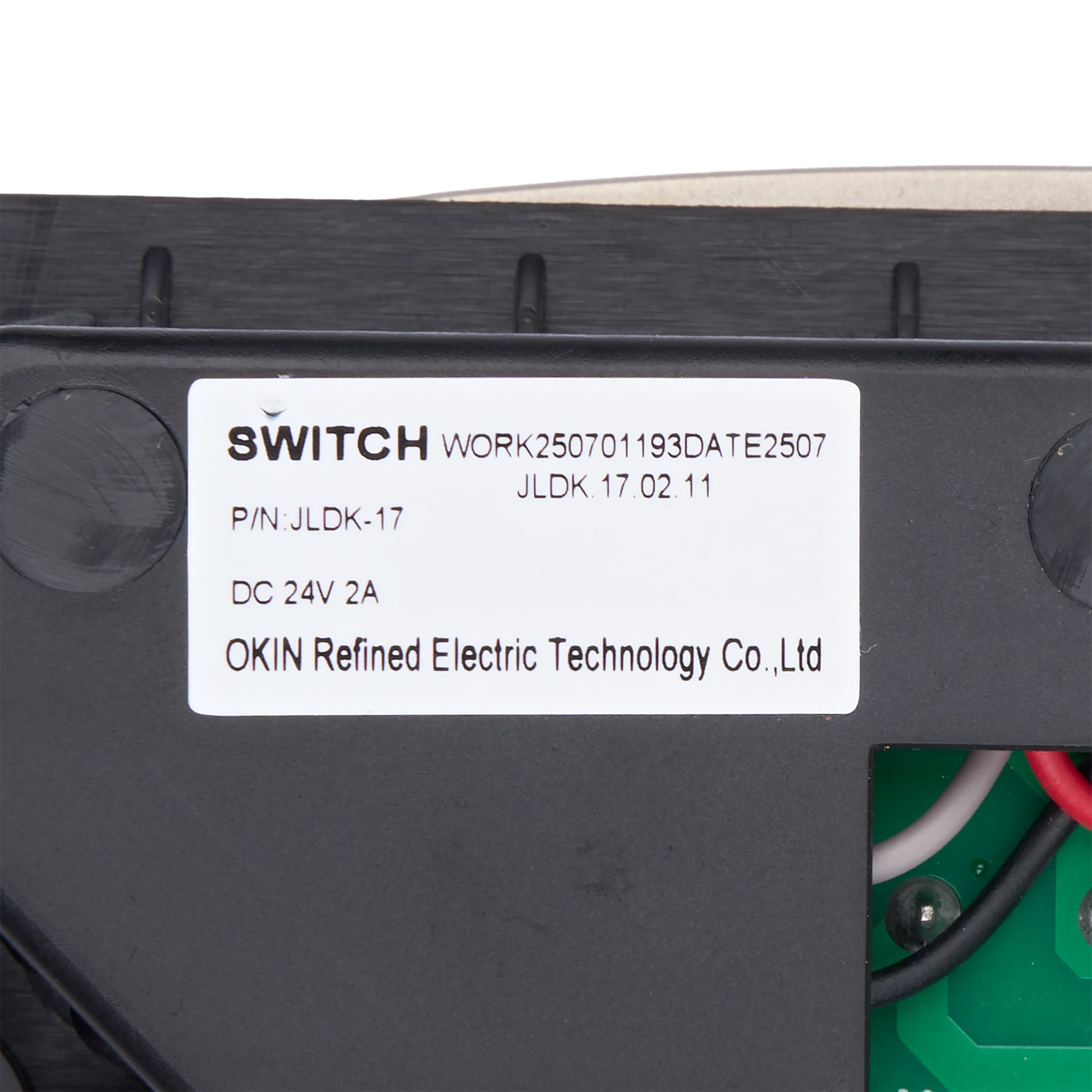 Label on a black electronic component with text and branding