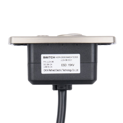 A black electronic switch module with a silver metal mounting plate and a black cable, featuring a white label with product specifications.