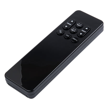 Black remote control on a white background