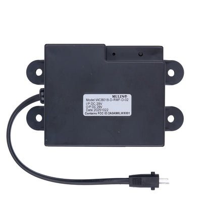 Black electronic module with a label on a white background