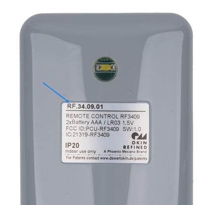 Gray remote control with label and OKIN Refined branding on a white background