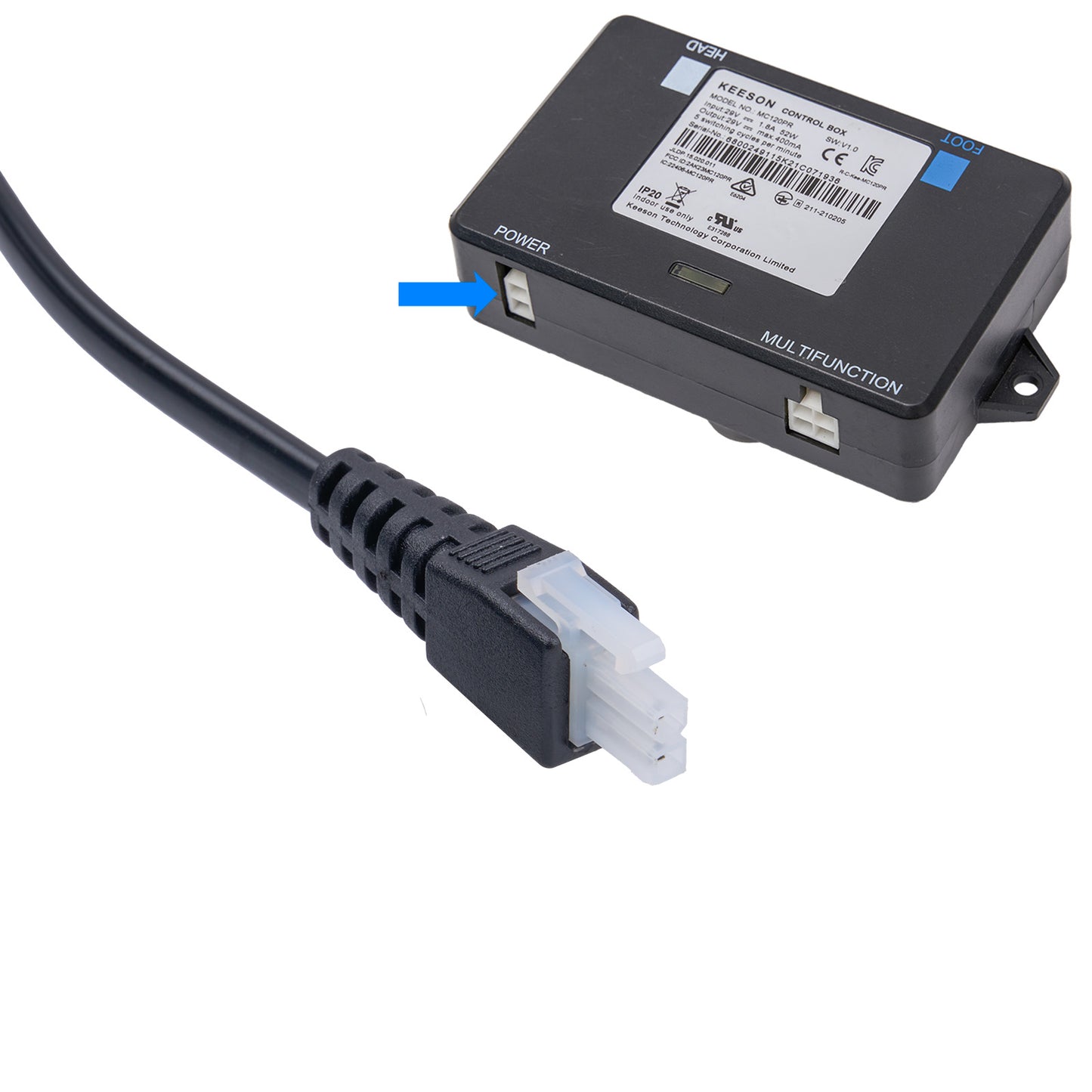Black electronic device with power cable on a white background