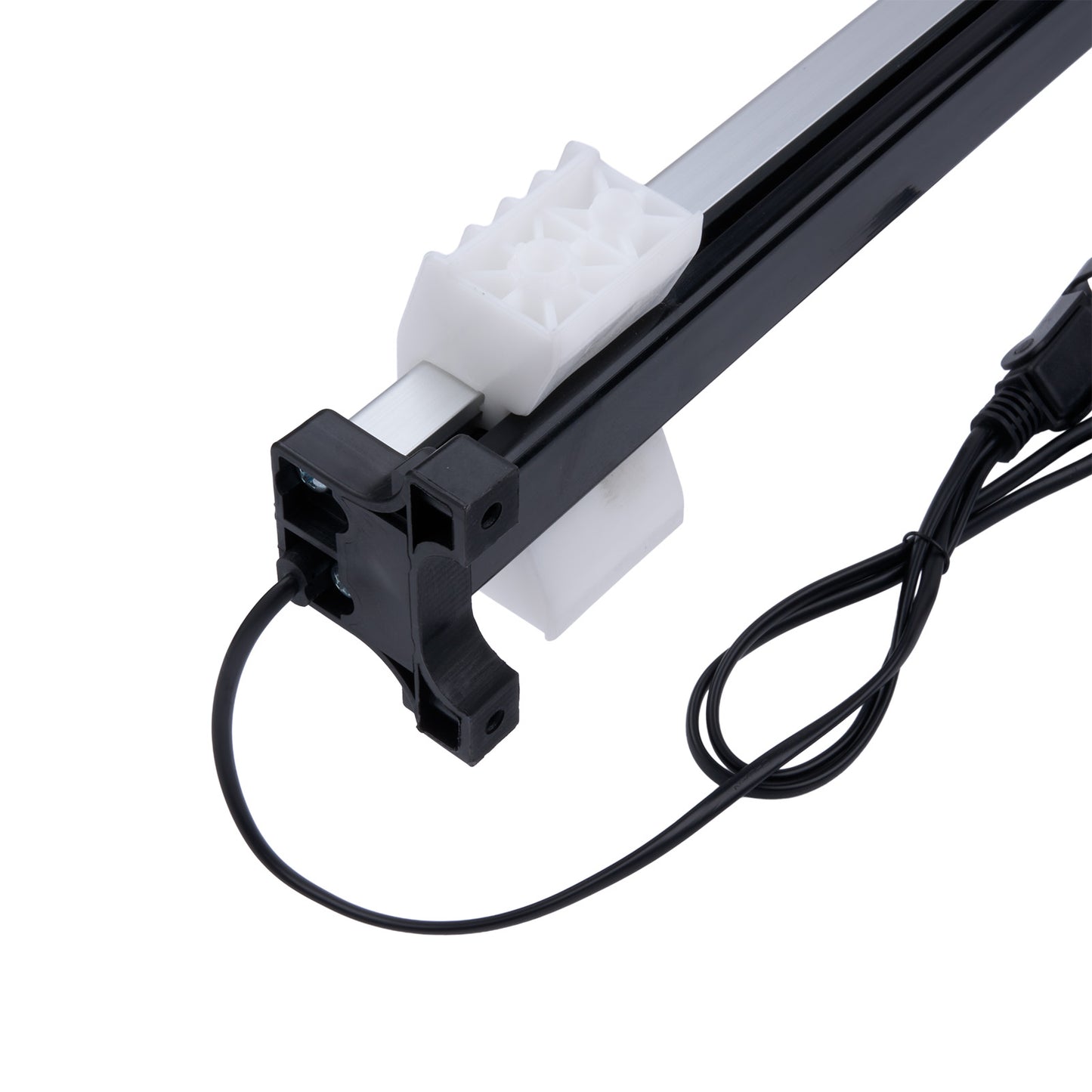 Mechanical arm with a white foam block and black cable on a white background