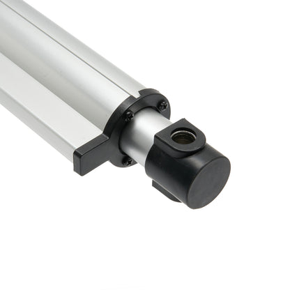 Metallic cylindrical object with a black fitting on a white background