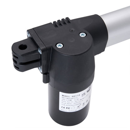 Black cylindrical motor with metallic extension on a white background