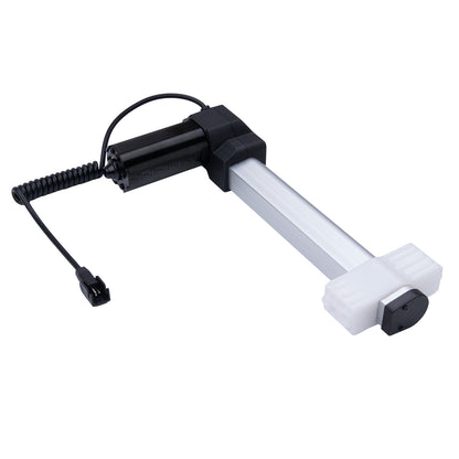 White light bulb with black base and coiled cord on a white background