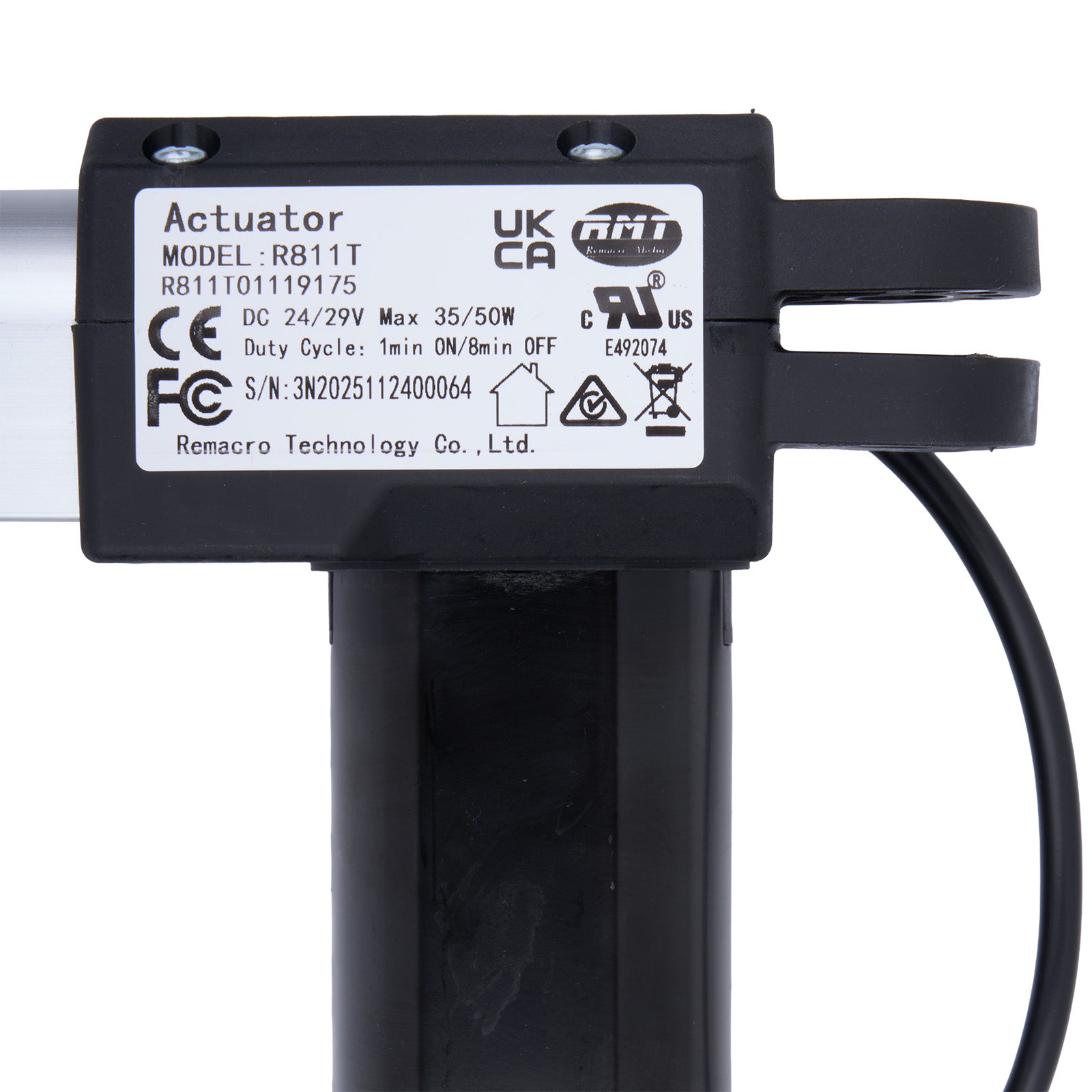 Black actuator with label on a white background