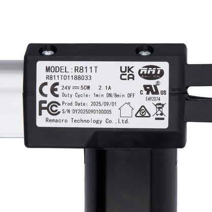 Black electronic component with certification labels on a white background
