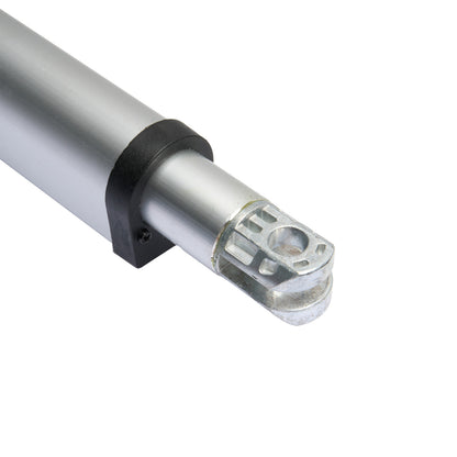 Metallic cylindrical component with clear plastic end on white background