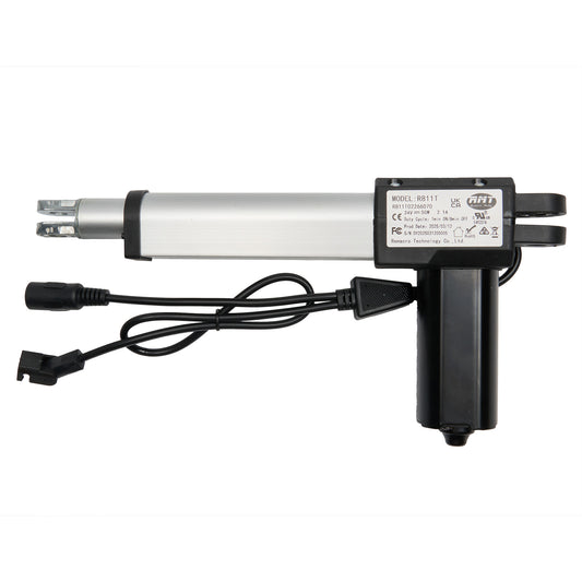 A RMT brand linear actuator with model number R811T02266070, featuring a silver cylinder, black wiring, and plugs connected to a power adapter.