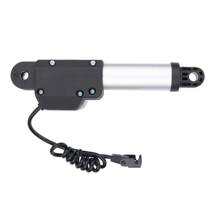 Mechanical component with black housing and silver cylindrical part on a white background