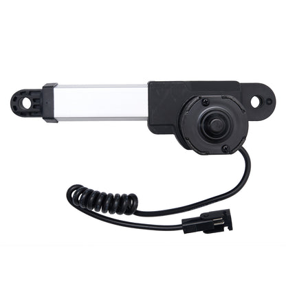 Mechanical component with black casing and coiled cable on white background
