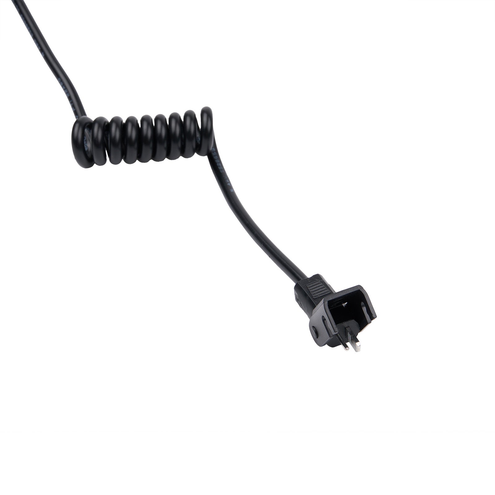 Black coiled cable with a plug on a white background
