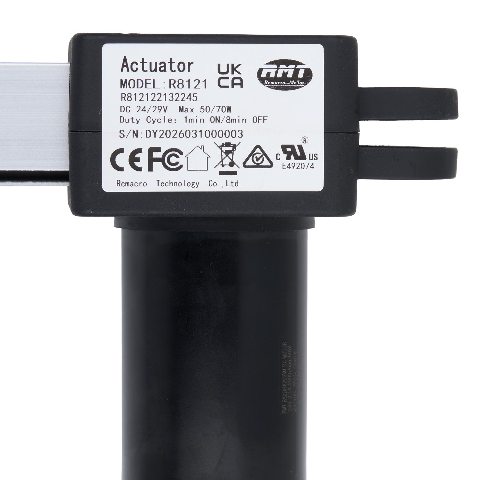 Black actuator with label on a white background
