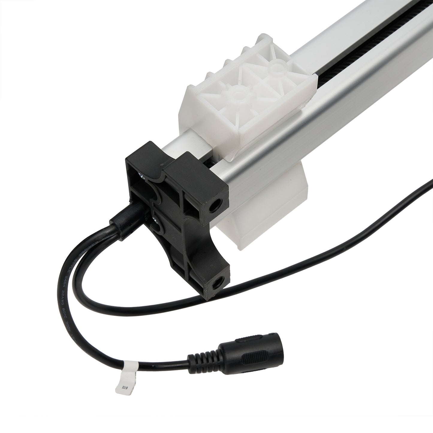 Close-up of a mechanical component with a white gear and black wiring on a white background.