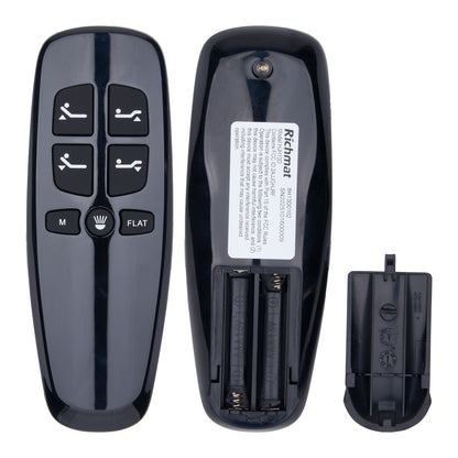 Black remote control with battery compartment on a white background