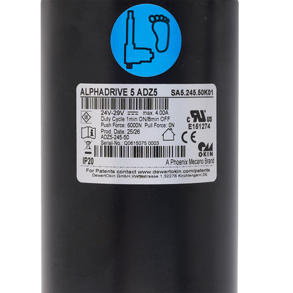Close-up of the side of a black cylindrical product with a white product label and a blue circular icon near the top. The label reads ALPHADRIVE 5 ADZ5 and includes barcodes and certification marks.