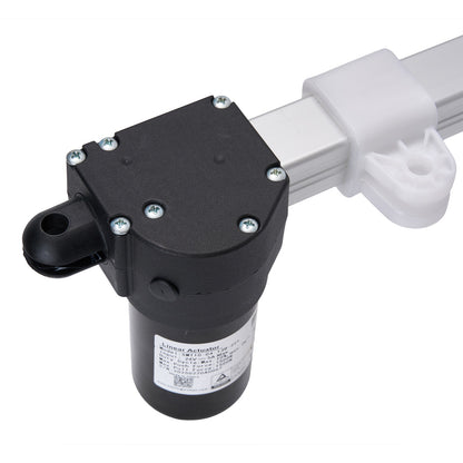 Black mechanical component with white handle on white background