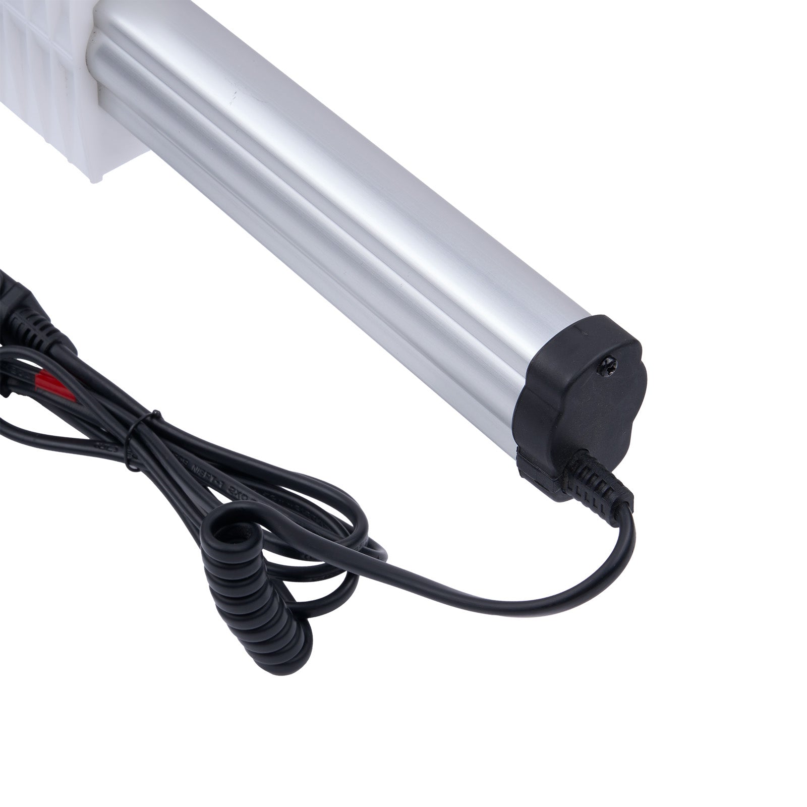 Metallic cylindrical device with a power cord on a white background