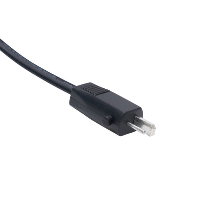 Black electrical cable with plug on white background