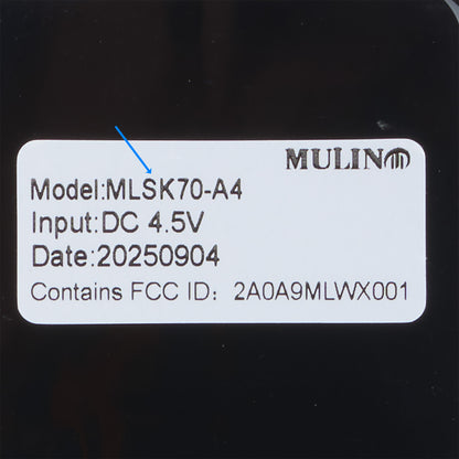 Product label with model number, input voltage, date code, and FCC ID on a black background