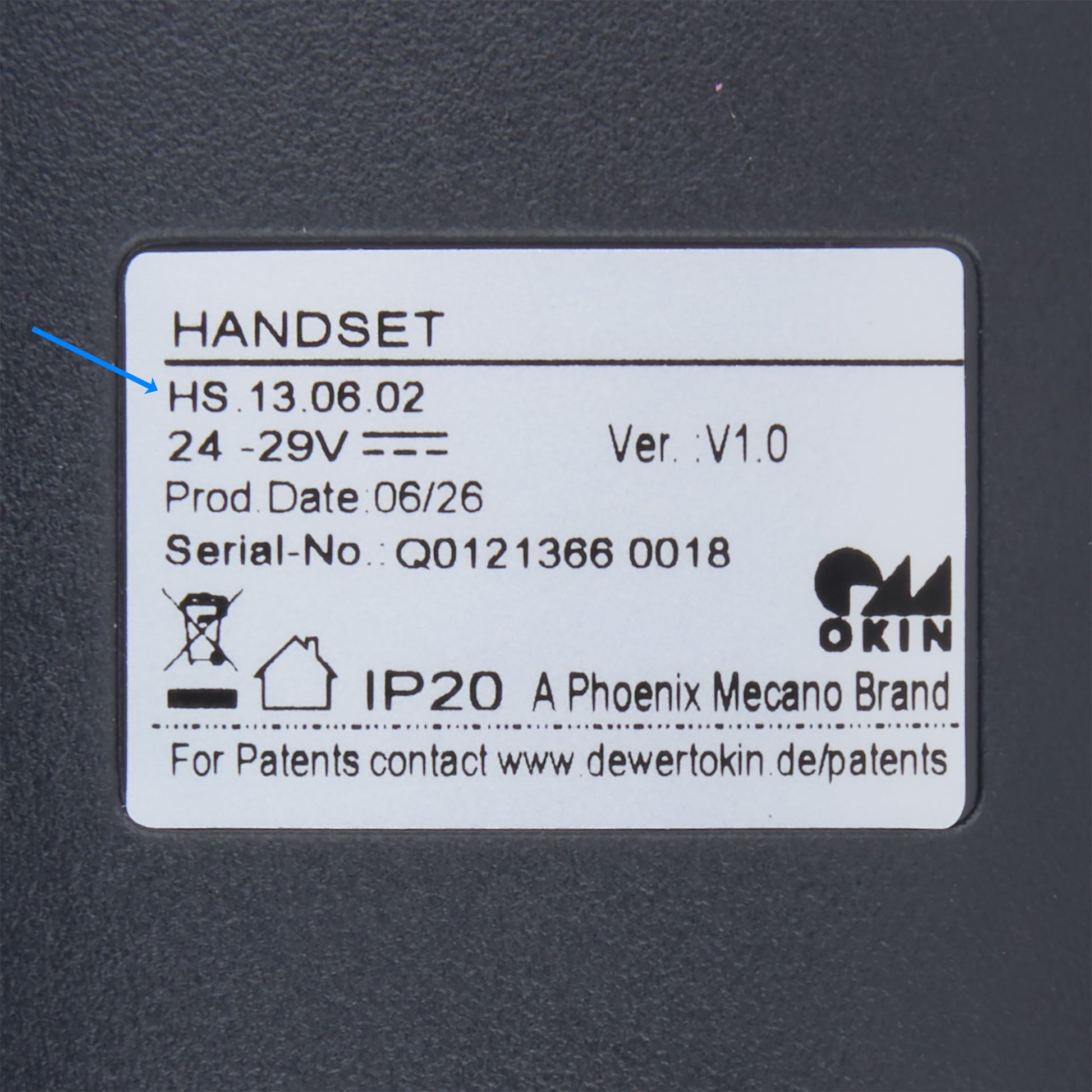 Electronic device with a display and cable on a white background